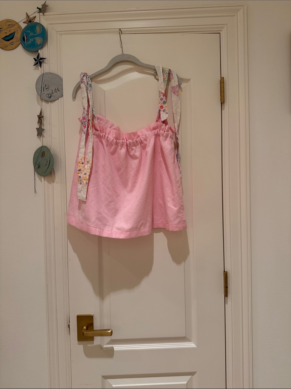 Light pink tie sleeve top